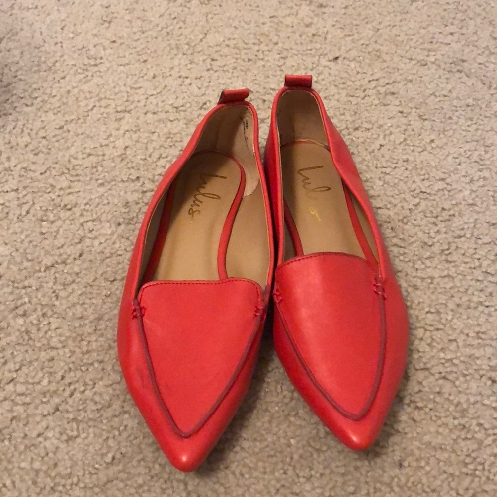 Bright red pointed toe loafers